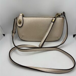 Joy Susan mini crossbody wristlet clutch in a metallic champagne vegan leather
